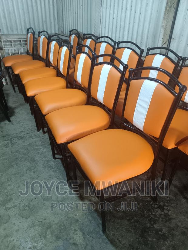 Restaurant Chairs Orange and White.