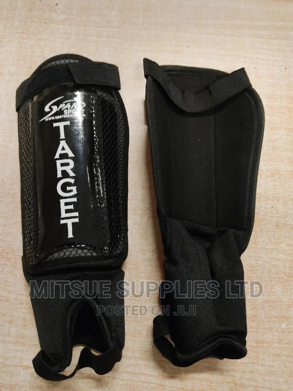 A Pair of Football/Hockey Shin Guard With Anklet