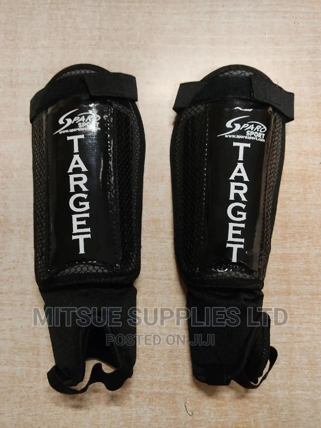 A Pair of Football/Hockey Shin Guard With Anklet