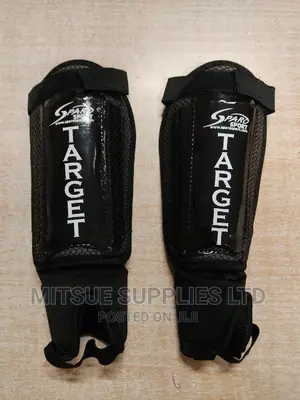 A Pair of Football/Hockey Shin Guard With Anklet