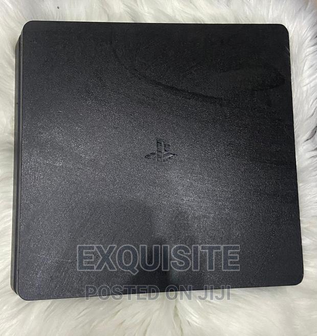 Playstation 4 Slim( Almost Brand New)