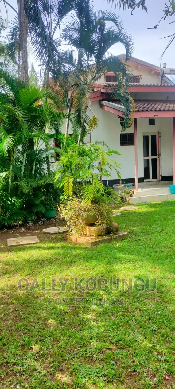An Acre Plot in Milimani Developed