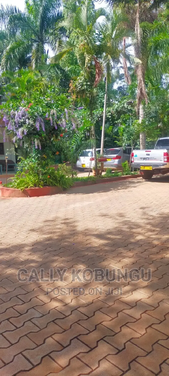 An Acre Plot in Milimani Developed