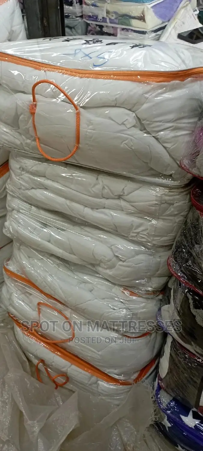 Plain White Cotton Duvets (Available in 5*6 and 6*6)