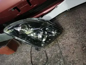 Suzuki Swift 2007 Black Shed Headlight Xenon RHS.