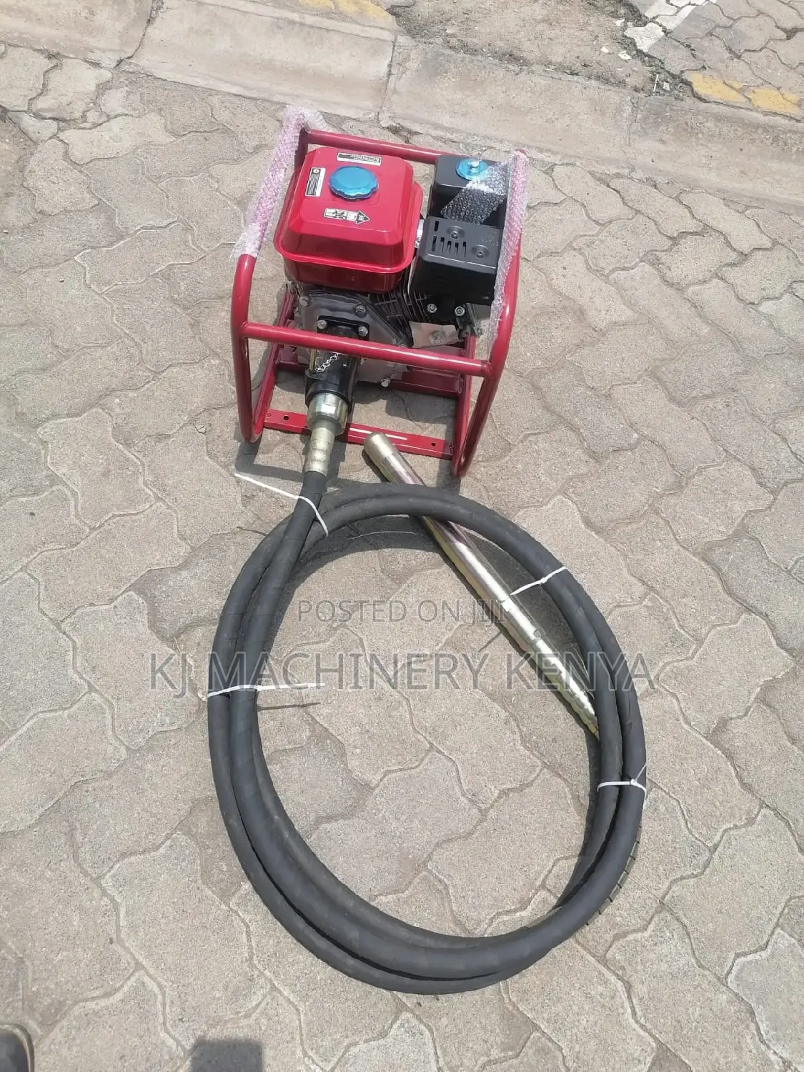 Windsor Poker Vibrator-Gasoline Powered.