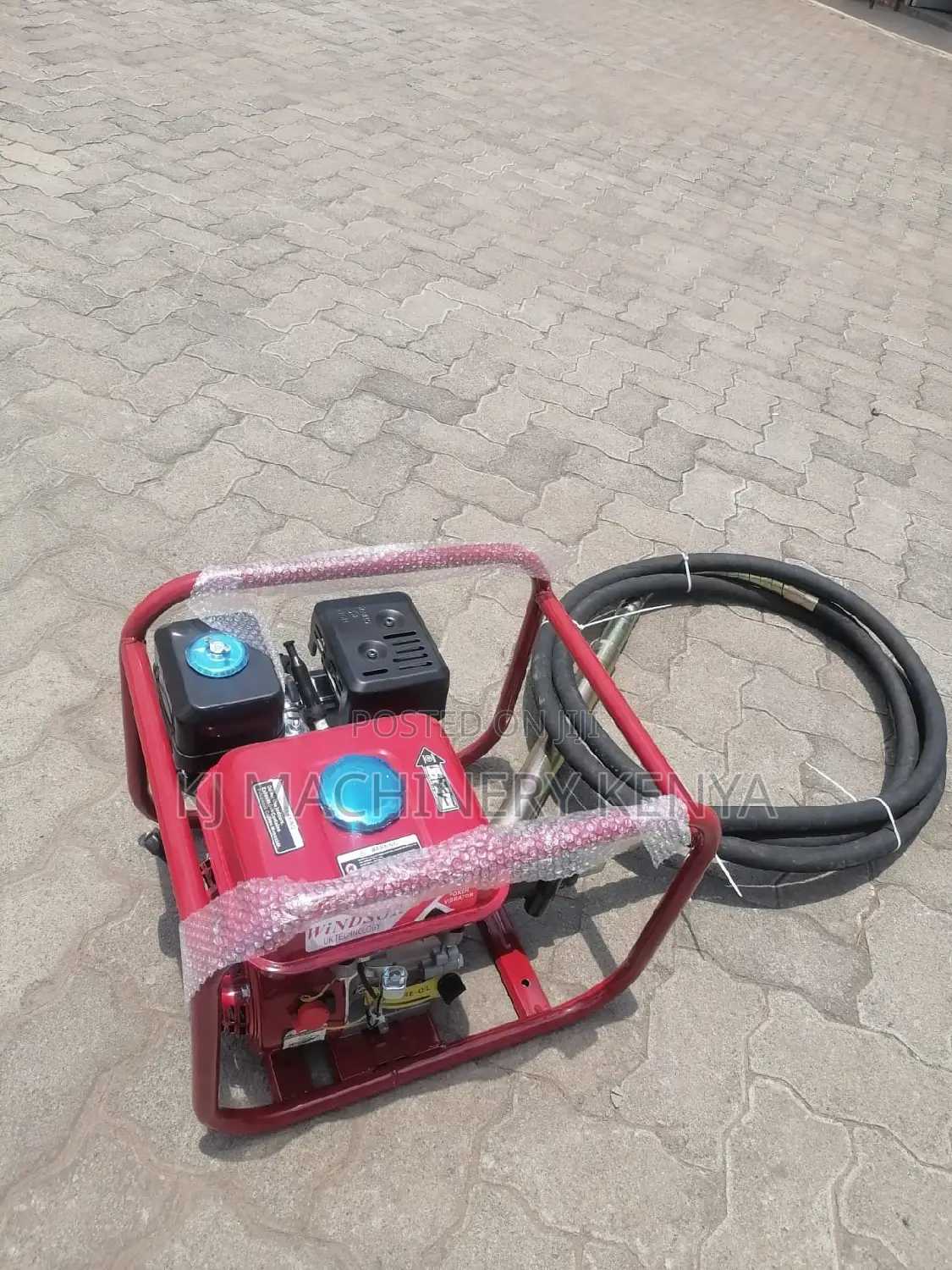 Windsor Poker Vibrator-Gasoline Powered.