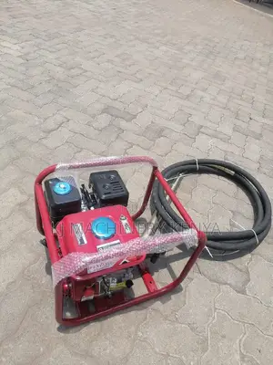 Windsor Poker Vibrator-Gasoline Powered.
