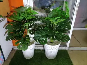 Plant Artificial With Vase and Pebble Stones on Offer