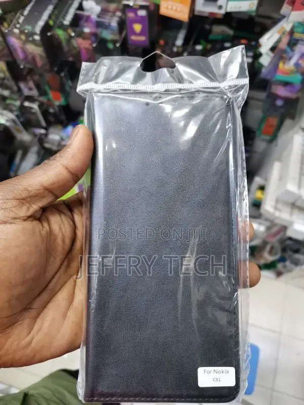 Pu Leather Flip Cover for Nokia C31 (Black)