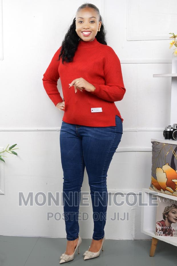 Official Turtle Neck Sweater