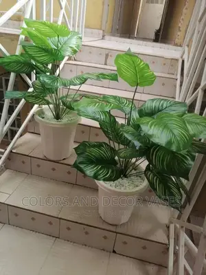 Plants Artificial With Plastic Vase and Pebble Stones