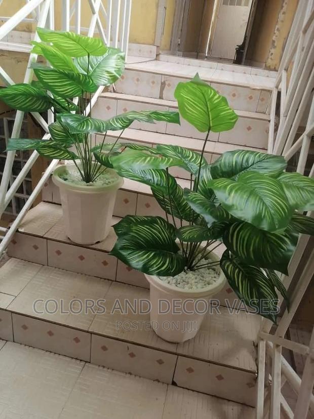 Plants Artificial With Plastic Vase and Pebble Stones