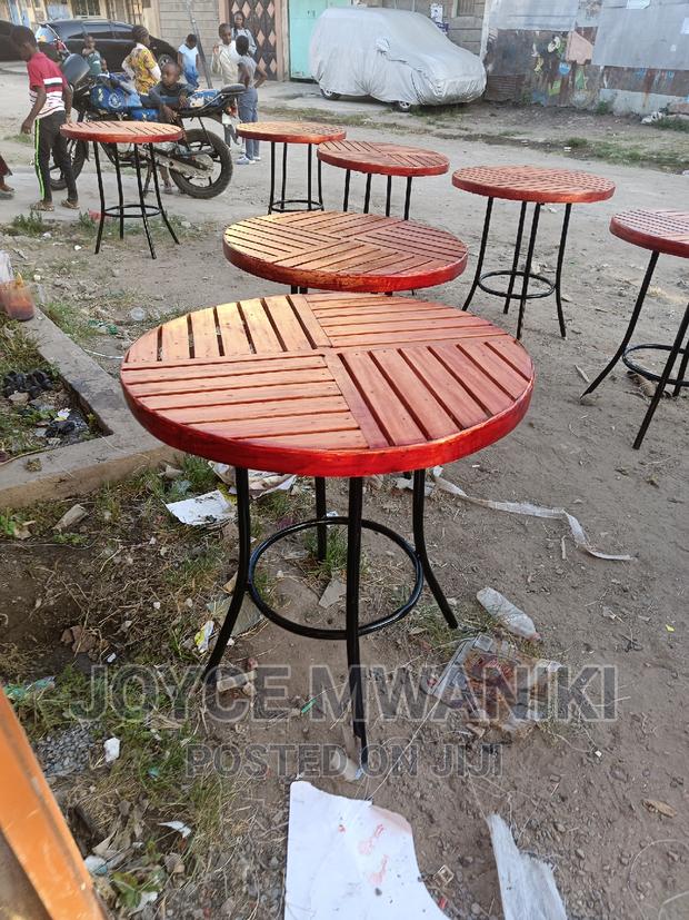 Mahogany Round Tables.