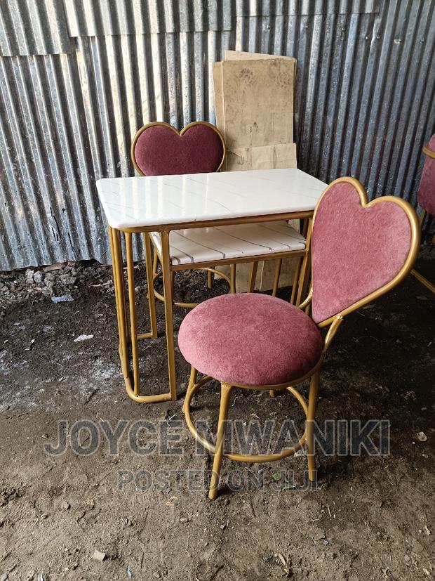 Manicure Set of 2 Love Seats and a Marble Table.