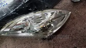 Suzuki Swif RHS Headlight Xenon Clear.