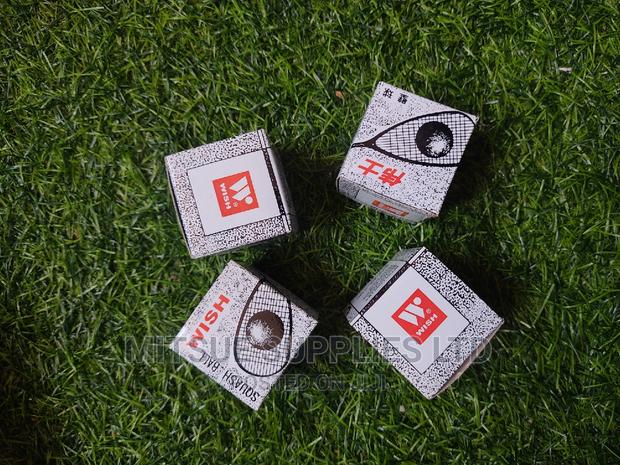 A Set of 4 Wish Squash Ball Double Yellow Dot