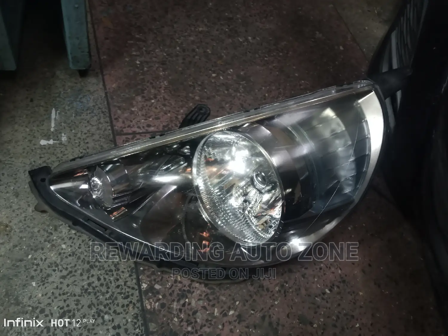 Honda Fit 2005 LHS Headlight Xenon.