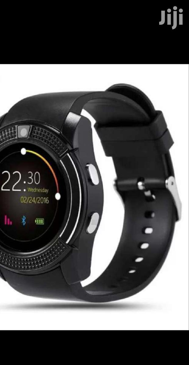 Smart Watch With Its Charger - main view