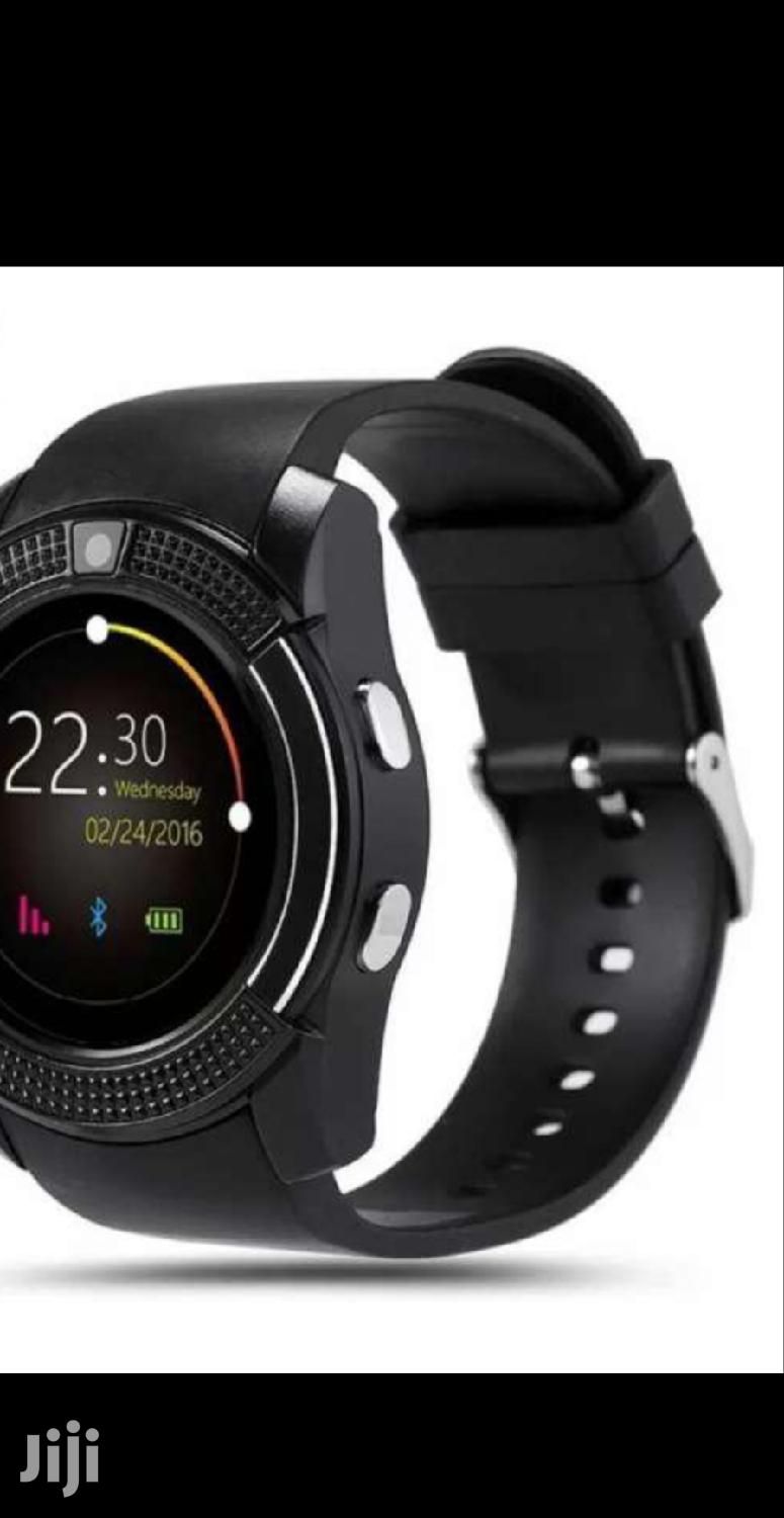 Smart Watch With Its Charger