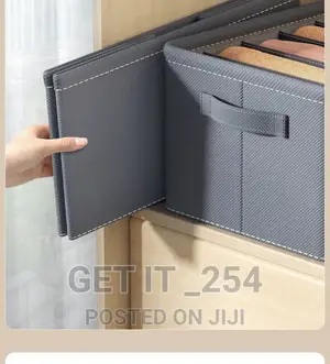 9 Grid Jeans Organizer 
Colour : Grey
Material :