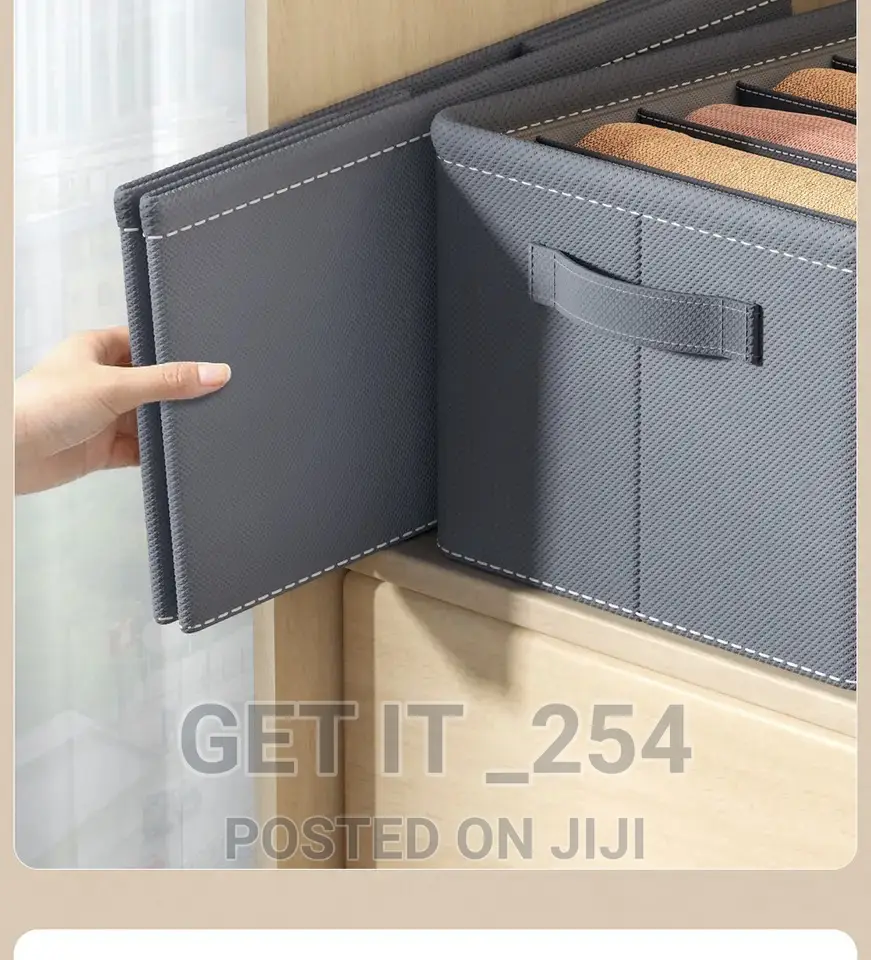 9 Grid Jeans Organizer 
Colour : Grey
Material :