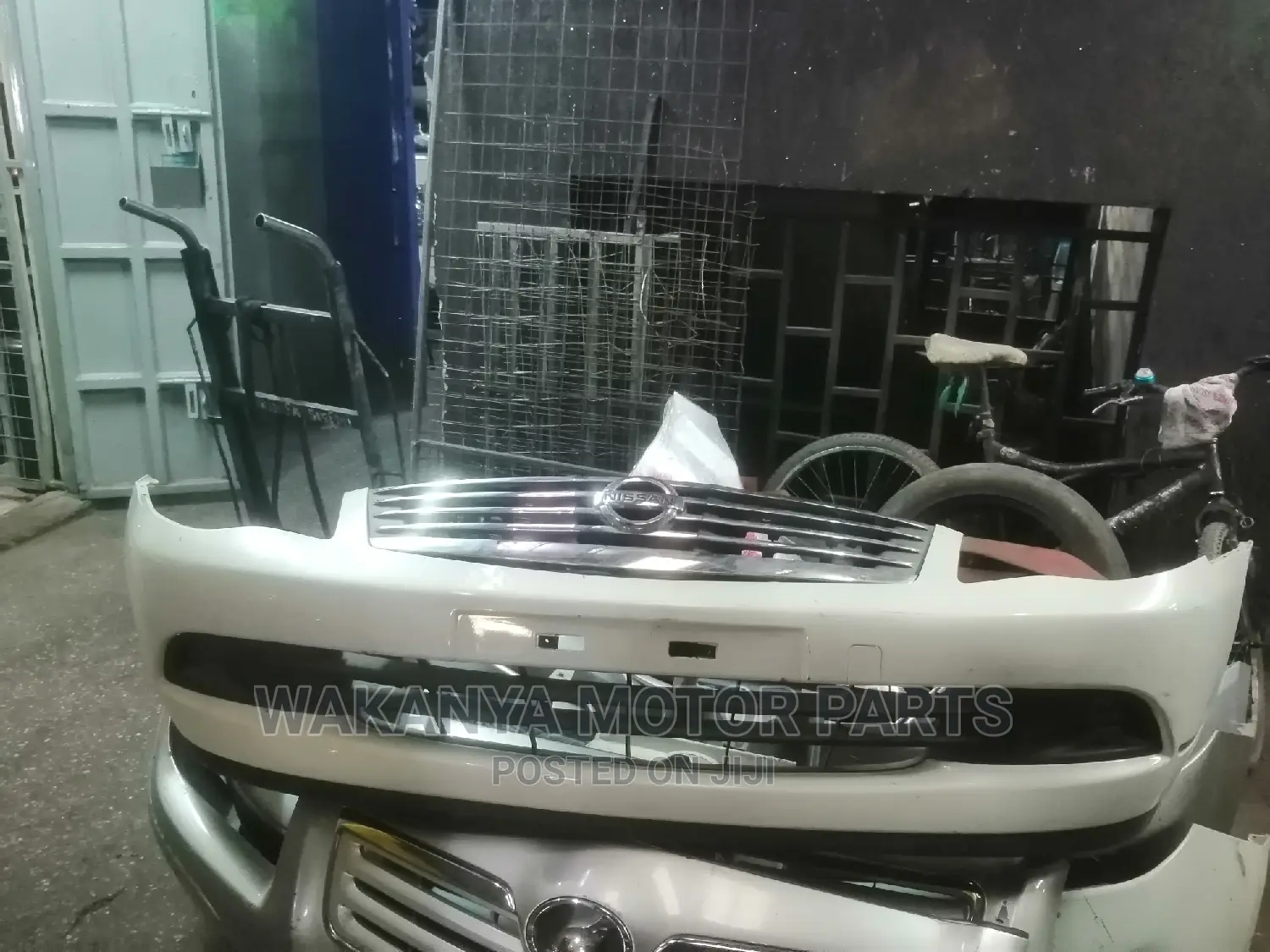 Nissan Bluebird Sylphy N17/G11 Bumper + Grille, 2006/2012