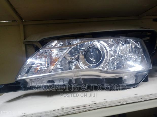 Fielder 161 Headlight Clear Xenon Lhs.