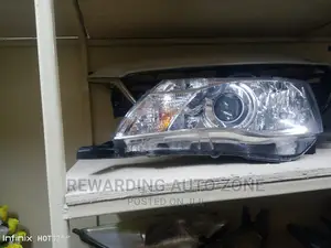 Fielder 161 Headlight Clear Xenon Lhs.