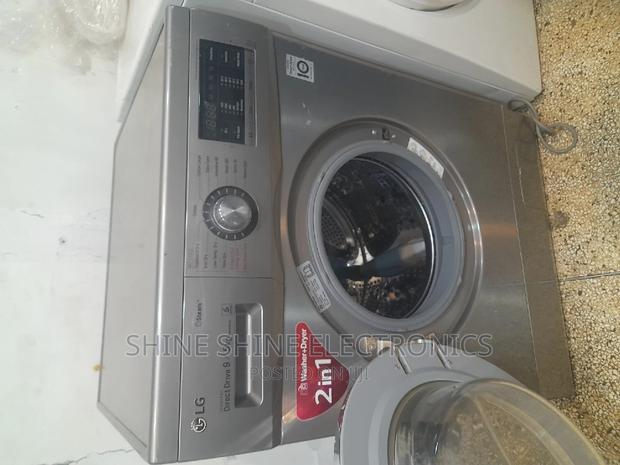LG Washing Machine 9/5 Kg Washer Dryer