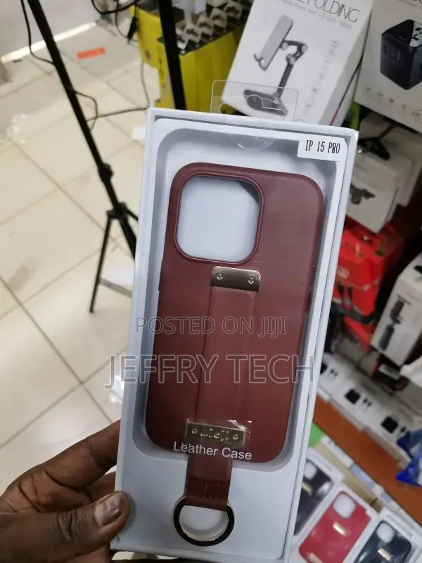 Leather Case With Wrist Strap, With iPhone 15 Pro Brown