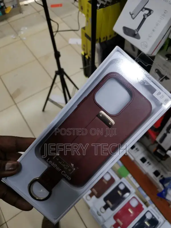 Leather Case With Wrist Strap, With iPhone 15 Pro Brown