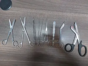 Surgical Stitching and Dressing Instruments