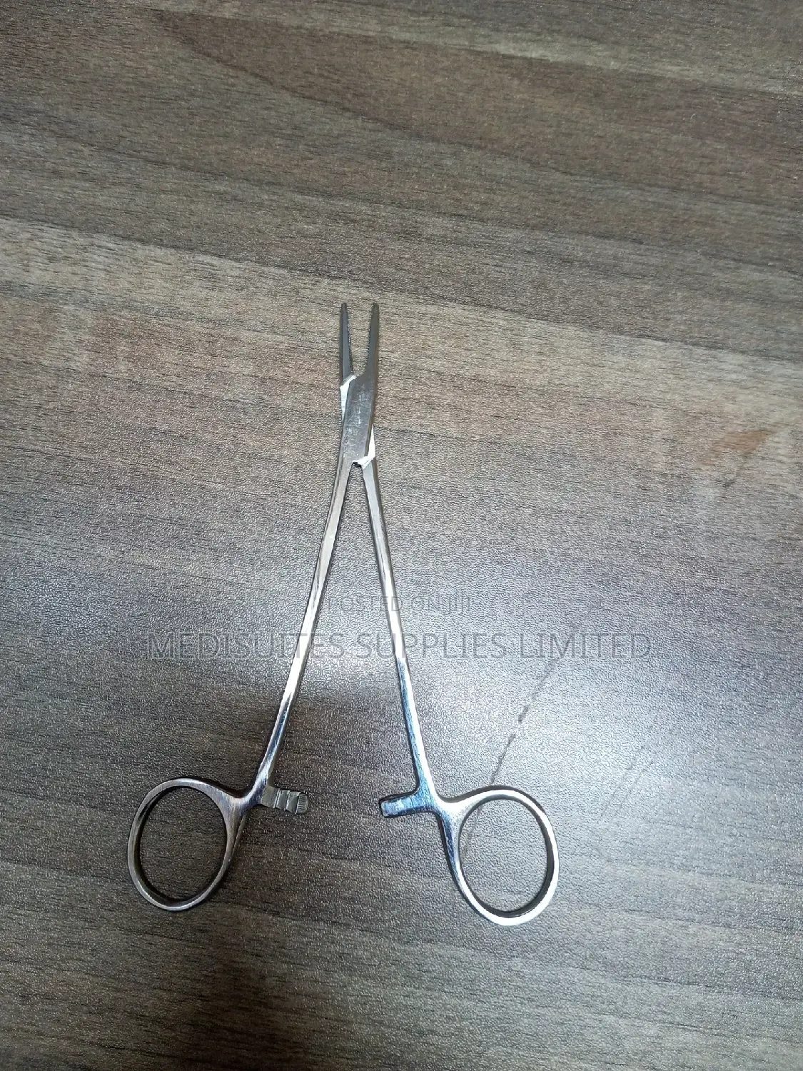 Needle Holder.