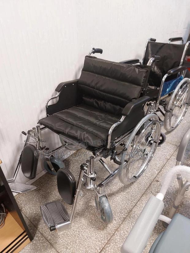 Extra Wide Wheelchair With Elevating Footrests. - main view