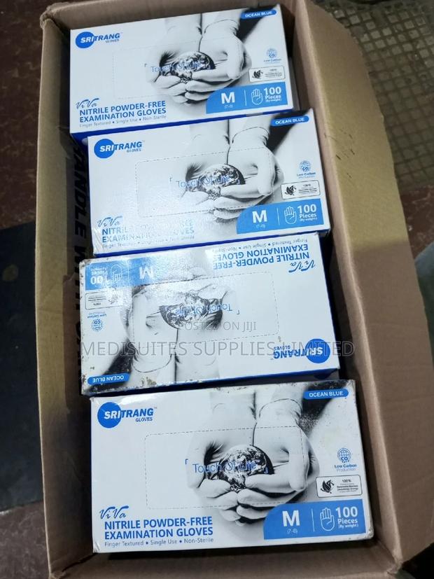 Blue Nitrile Gloves ." - main view