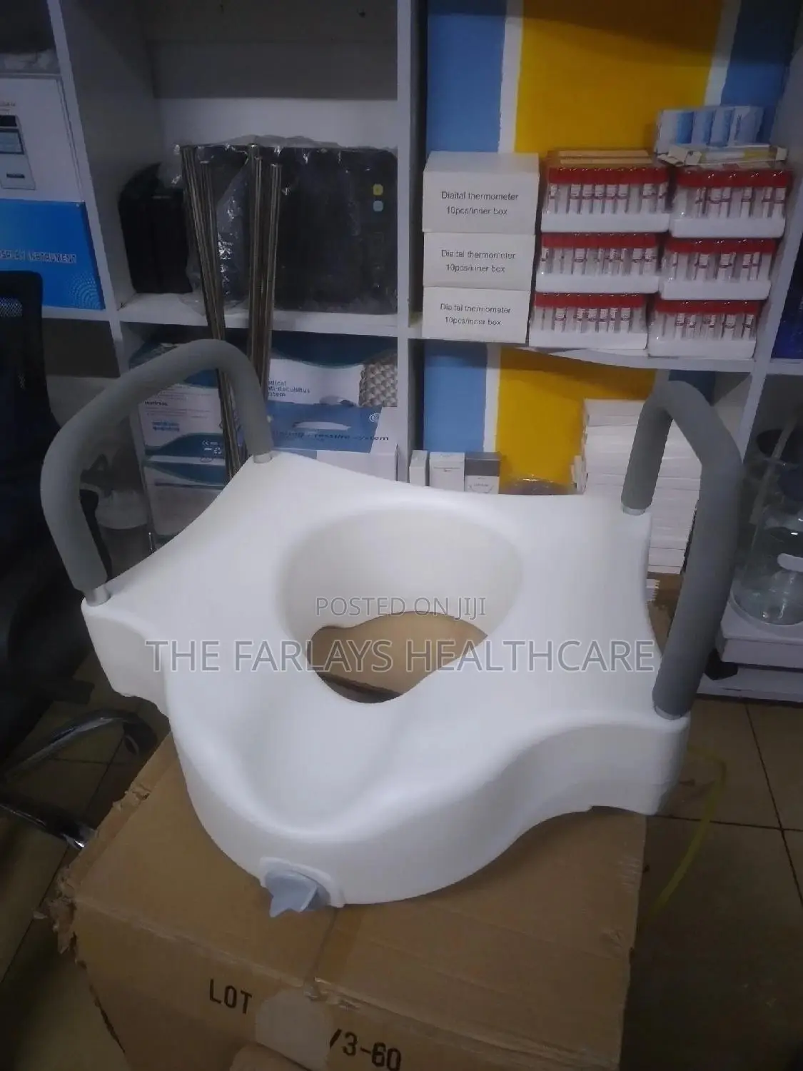 Toilet Raiser With Arm Rests.