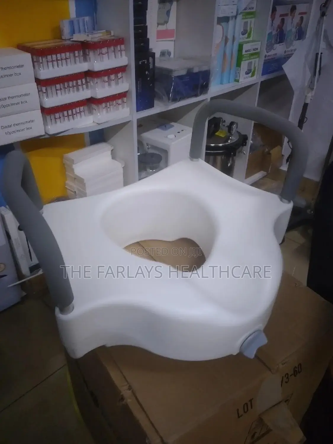 Toilet Raiser With Arm Rests.