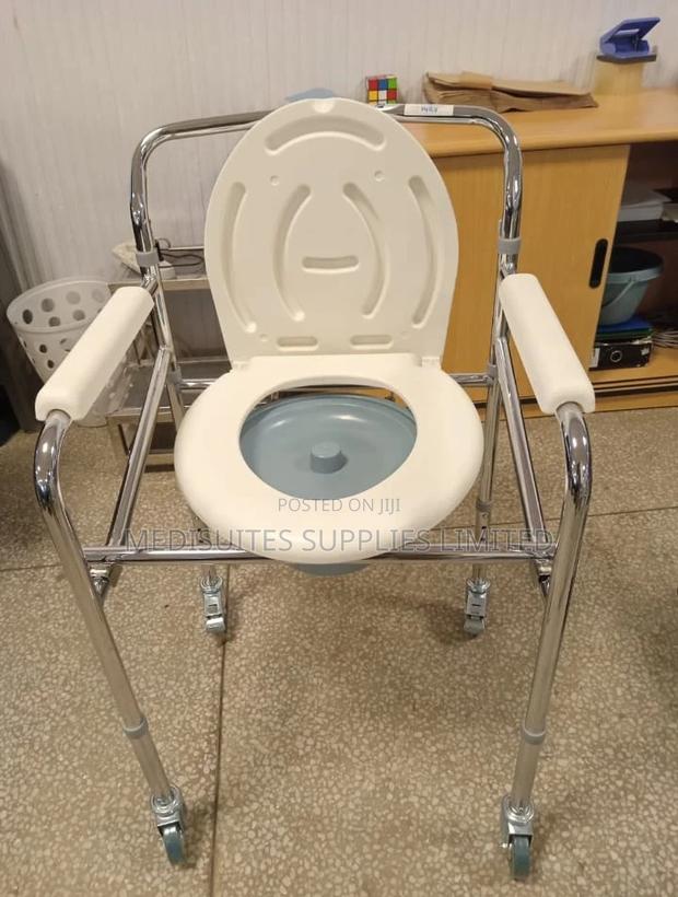 Foldable Commode Seat With Castors. - main view