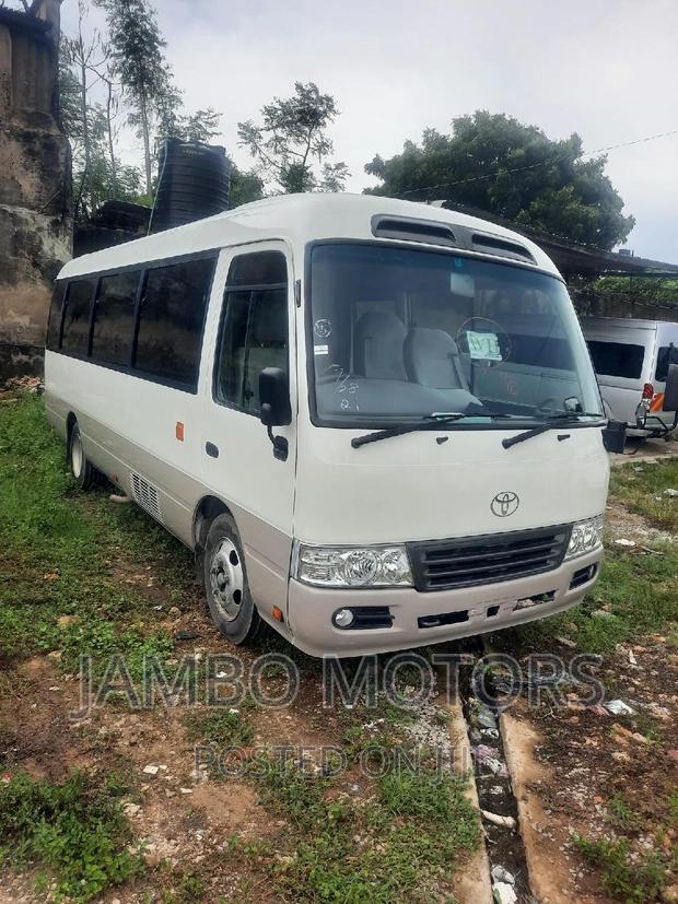 Toyota Coaster 2015 White - thumbnail 3