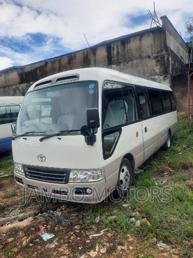 Toyota Coaster 2015 White - thumbnail 4