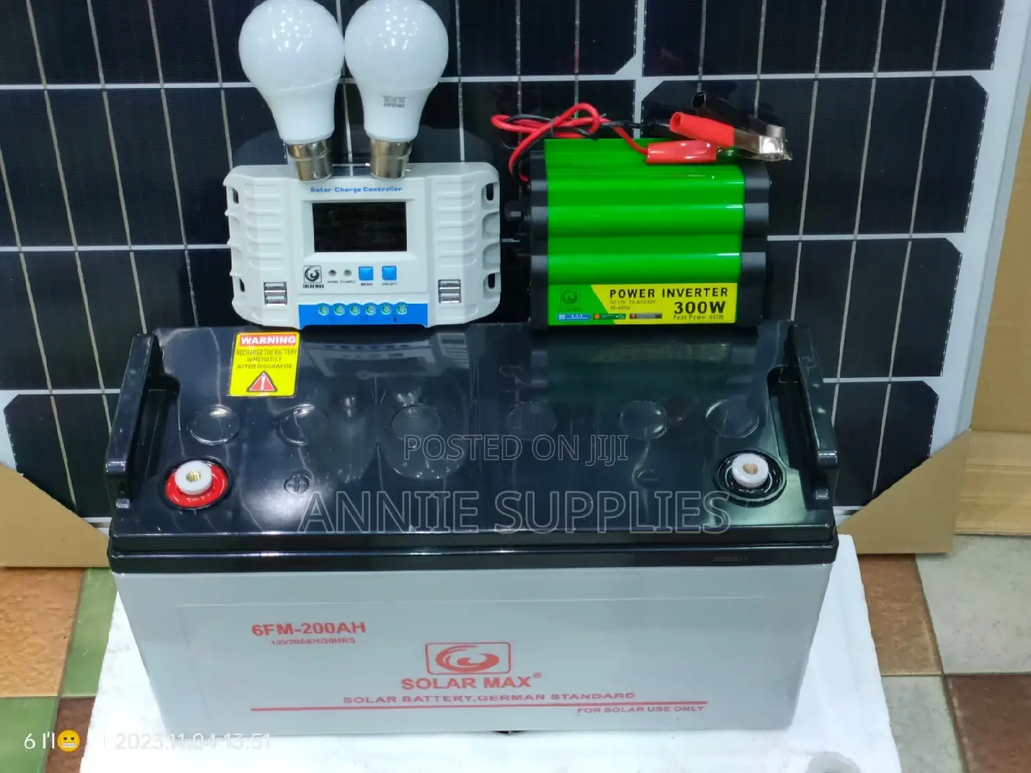 200ah Battery + 300w Inverter + 30a Controller +2 Dc Solar Bulbs