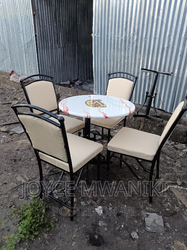 Restaurant Set of 4 Chairs and a Table, Cream.
