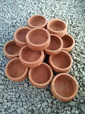 Rabbit Pellets and Water Bowls.