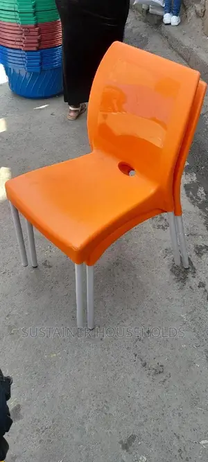 Orange Plastic Chairs With Metal Tubing Legs