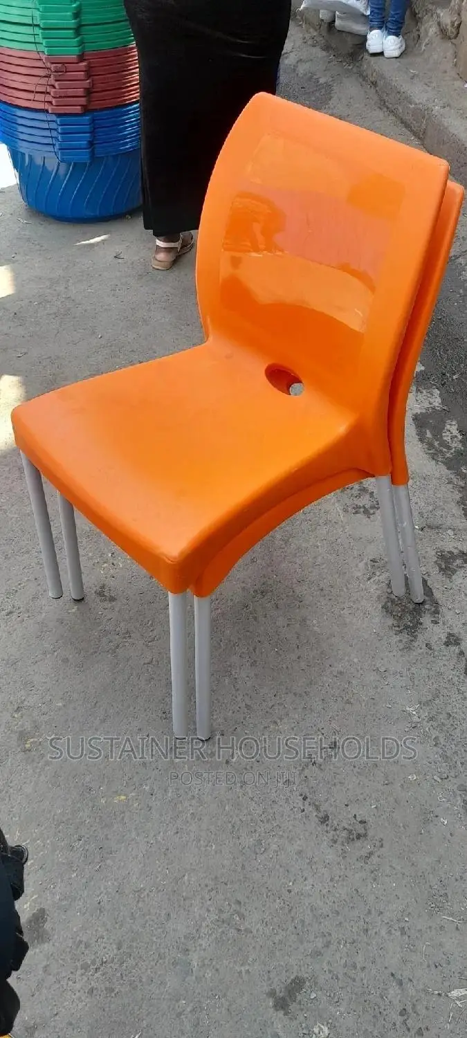 Orange Plastic Chairs With Metal Tubing Legs