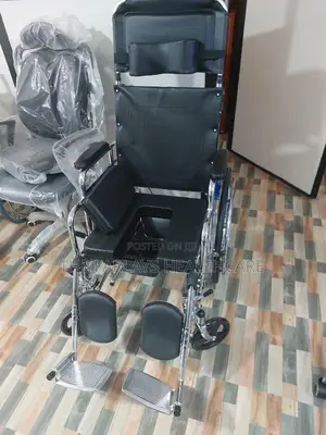 Reclining Wheelchair With Easy Use Commode.