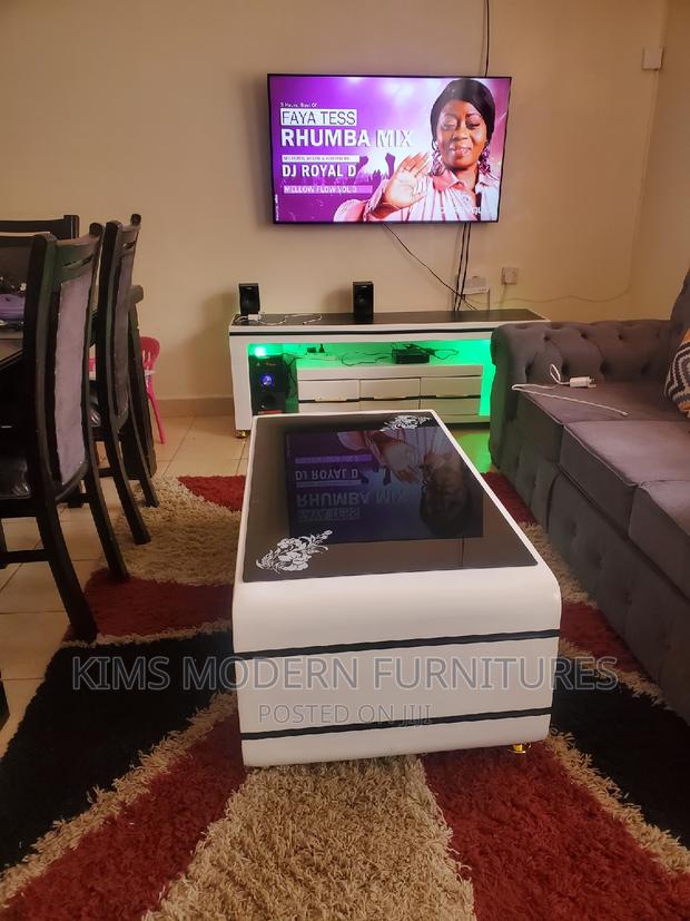 Coffee Table and a Tv Stand With Led Lights. - main view