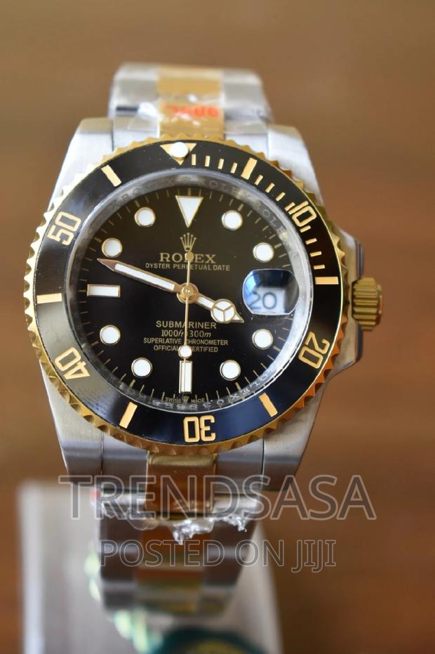 Rolex Submariner Two Tone Yellow Gold and Silver