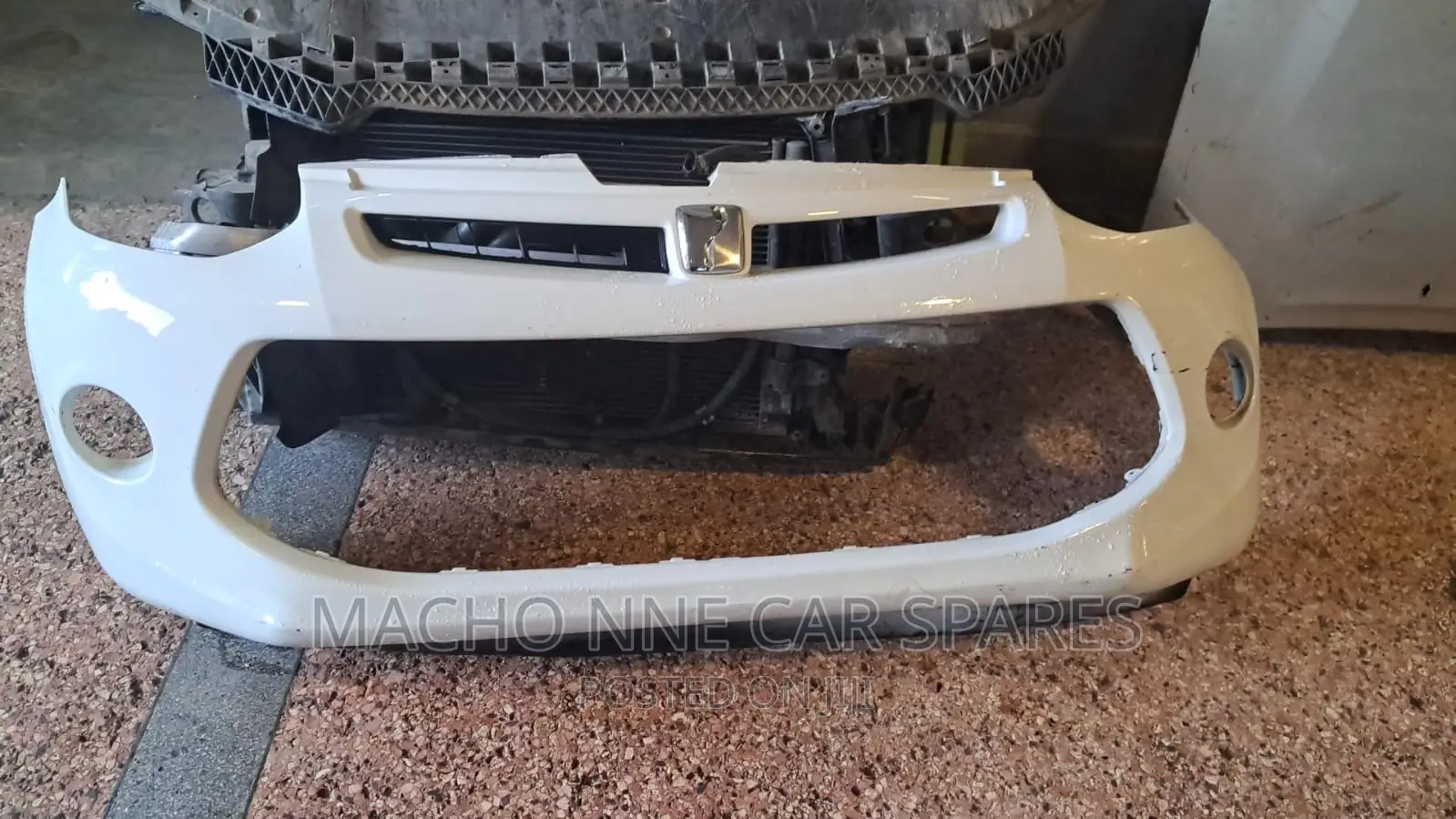 Toyota Passo 2015 Front Bumper (Comes With Lower Grill)